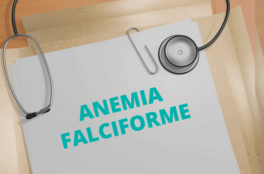 uma folha branca escrito anemia falciforme em verde